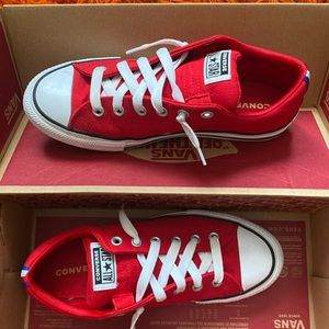 Junior size 6. Red converse low cut shoe.